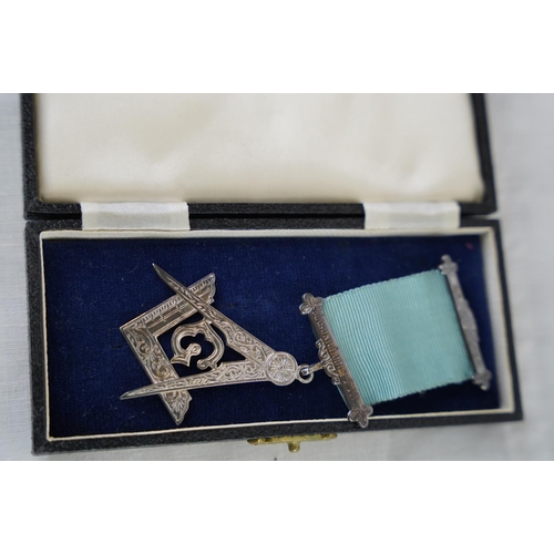 230 - A Sterling silver Masonic medal and a Sterling silver Mappin & Webb letter opener.