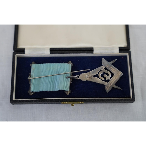 230 - A Sterling silver Masonic medal and a Sterling silver Mappin & Webb letter opener.