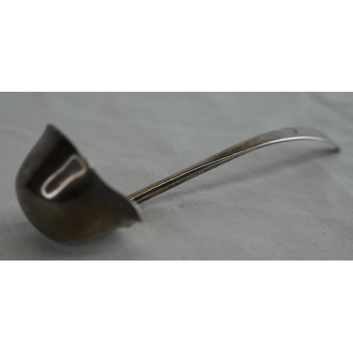 243 - A Sterling silver ladle with pourer, Sheffield 1922, weight 20g.