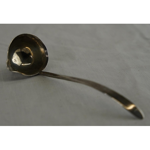 243 - A Sterling silver ladle with pourer, Sheffield 1922, weight 20g.