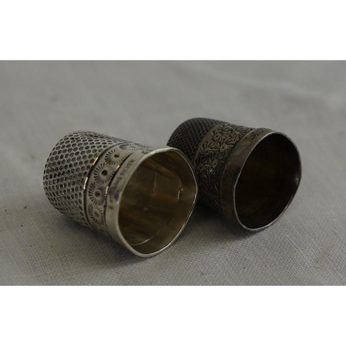 249 - Two antique Sterling silver thimbles.