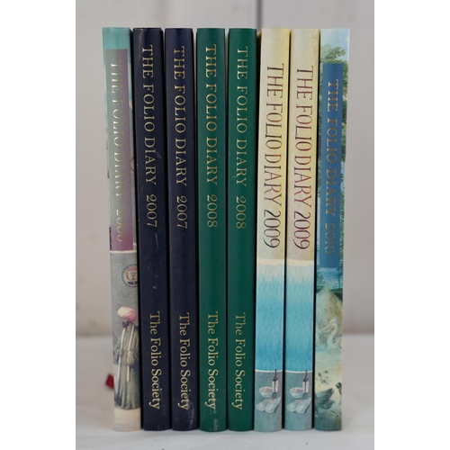 429 - Eight Folio Society diaries.