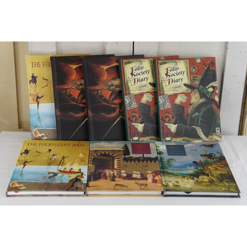 429 - Eight Folio Society diaries.