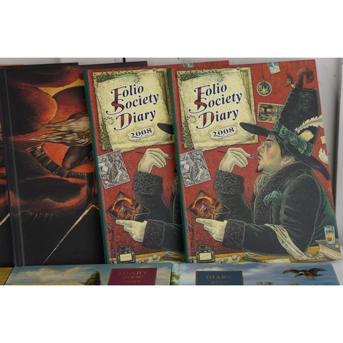 429 - Eight Folio Society diaries.