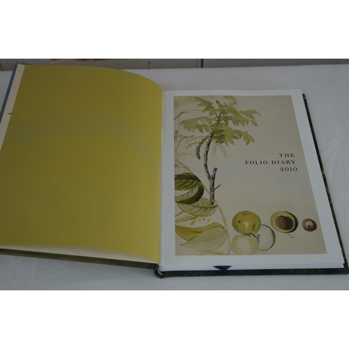 429 - Eight Folio Society diaries.