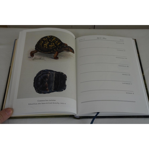 429 - Eight Folio Society diaries.