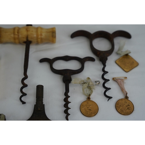 265 - An antique bone handled corkscrew, a vintage Hadson Scorpio lighter,  a vintage Ronson lighter and m... 