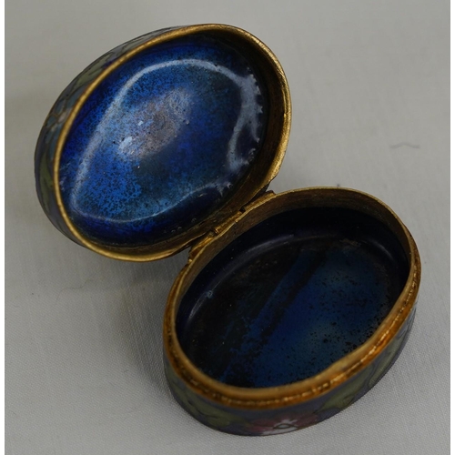 282 - A stunning Cloisonne tapestry topped pill box.