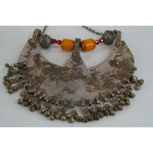 293 - A vintage decorative metal and beaded tribal style necklace.