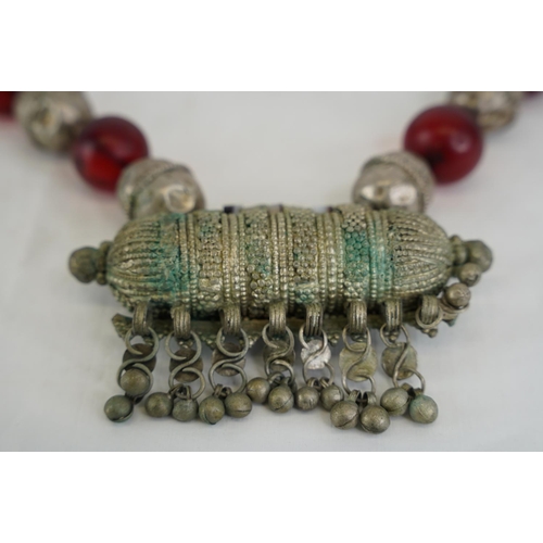 294 - A vintage decorative metal and beaded tribal style necklace.