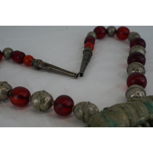 294 - A vintage decorative metal and beaded tribal style necklace.