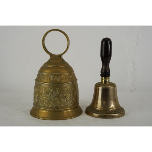 A Danish cowl bell and a small wooden handled school bell, measuring ...