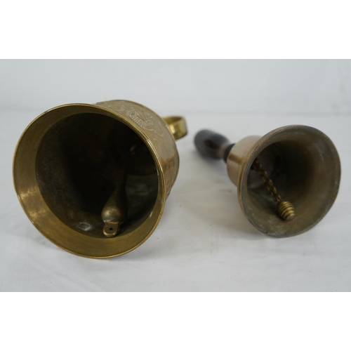 A Danish cowl bell and a small wooden handled school bell, measuring ...