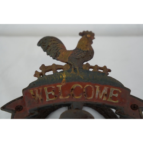 300 - A 'Welcome' cast iron bell.