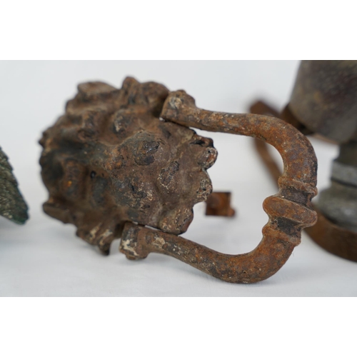 303 - An antique door knocker of a lions head, a pair of field glasses and more.