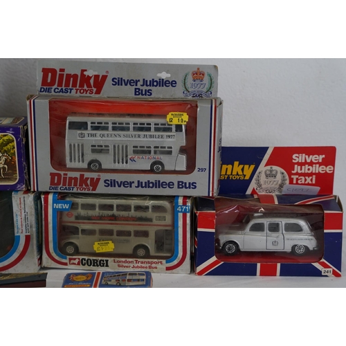 313 - A lot of vintage toys to include a boxed Dinky Silver Jubilee bus, a Corgi London Transport bus and ... 