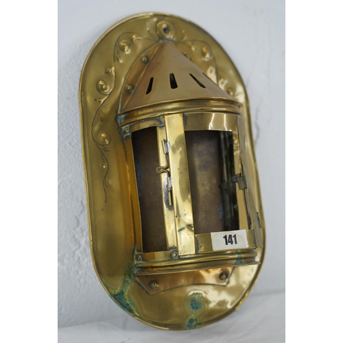 330 - A wall mounted brass lantern.