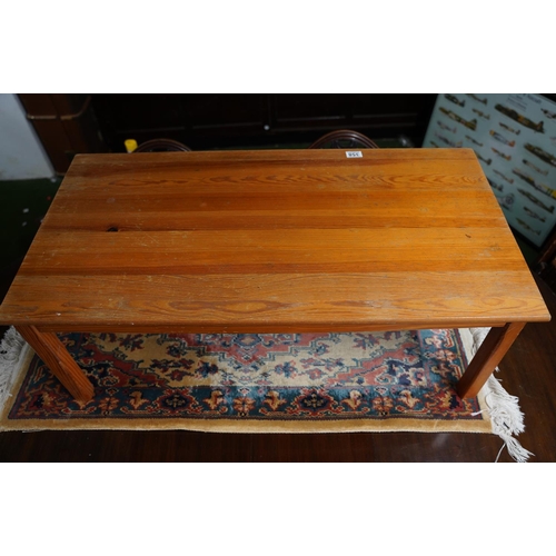 358 - A pine coffee table, measuring 101cm x 51cm.