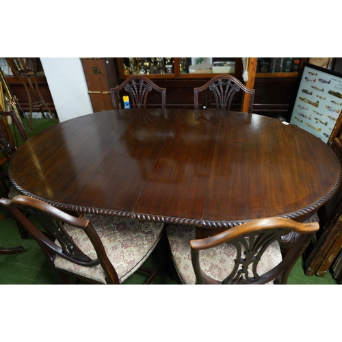 362 - An antique mahogany dining room table and a set of six chairs, measuring 160cm x 100cm (including ex... 