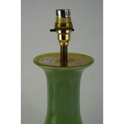 377 - A green glass lamp base, measuring 50cm.