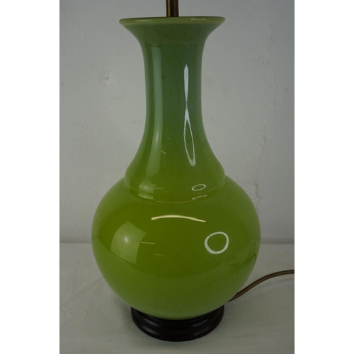 377 - A green glass lamp base, measuring 50cm.