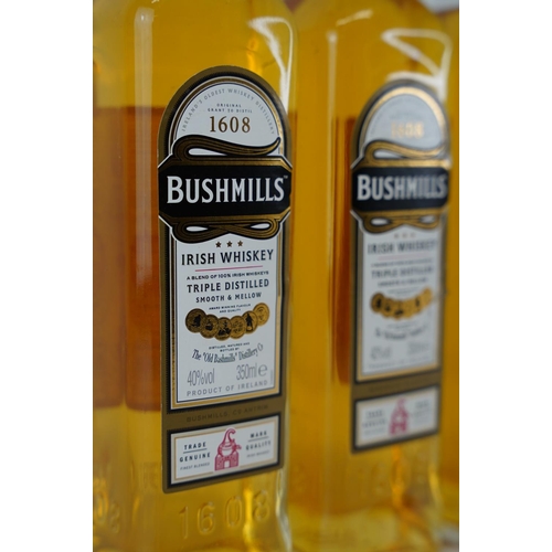 403 - Four 350ml bottles of Bushmills Irish Whiskey.