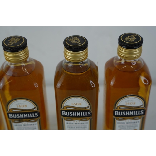 404 - Four 350ml bottles of Bushmills Irish Whiskey.