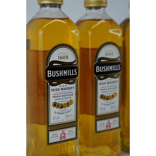 404 - Four 350ml bottles of Bushmills Irish Whiskey.