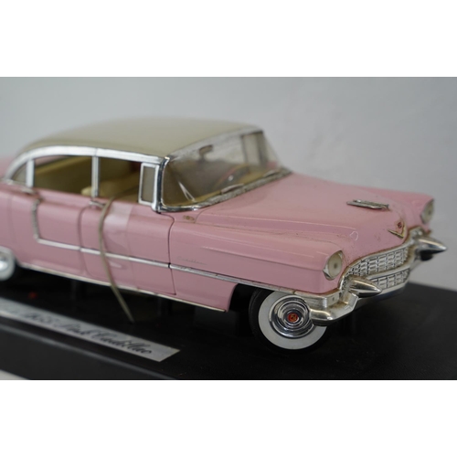 416 - A large 'Elvis 1955 Pink Cadillac' diecast toy car, measuring 30cm.