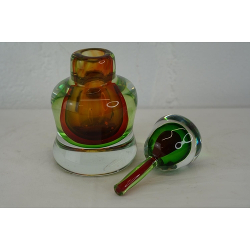 420 - A large vintage coloured glass perfume bottle.