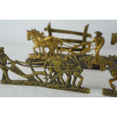 433 - A vintage brass letter rack of a horse and plough, a vintage brass horse and cart and more.