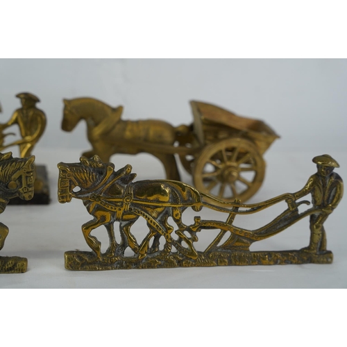 433 - A vintage brass letter rack of a horse and plough, a vintage brass horse and cart and more.