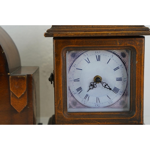 435 - Two wood cased mantle clocks.