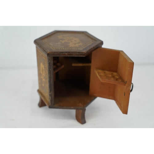 468 - A small wooden hexagonal cigarette box with inlay detail.