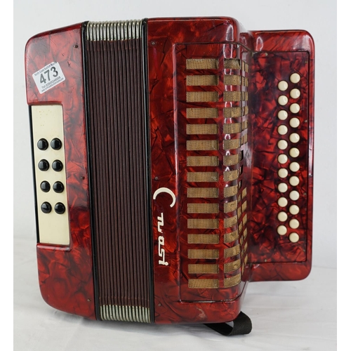 473 - A vintage accordion.