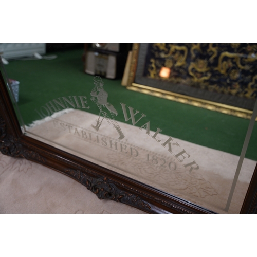 411 - A superb framed Johnnie Walker pub mirror, measuring 112cm x 82cm.