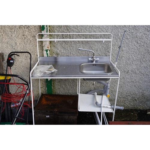 495 - A galvanised sink unit and stand