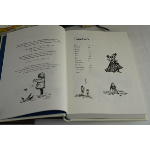 456 - Eight Folio Society Dairies various years.