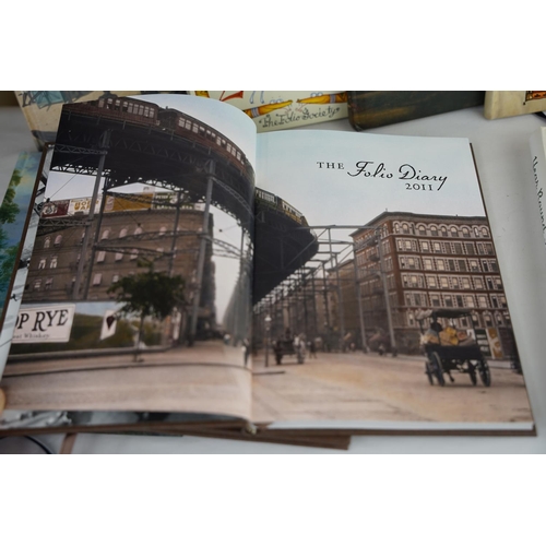 456 - Eight Folio Society Dairies various years.