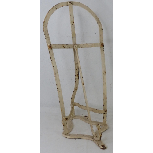 100 - A vintage metal saddle rack.
