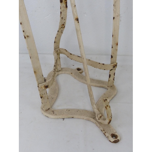100 - A vintage metal saddle rack.
