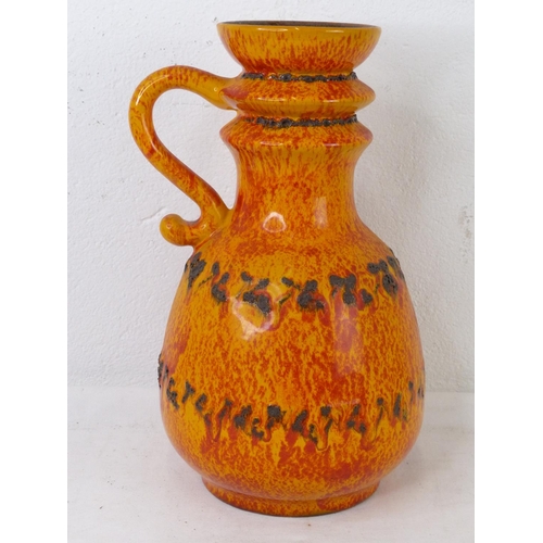 85 - A vintage pottery handled vase.