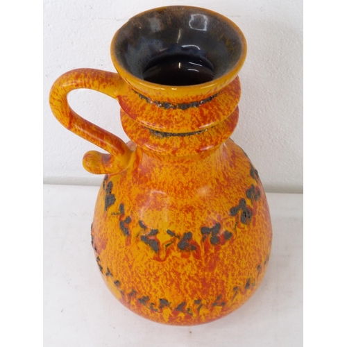 85 - A vintage pottery handled vase.