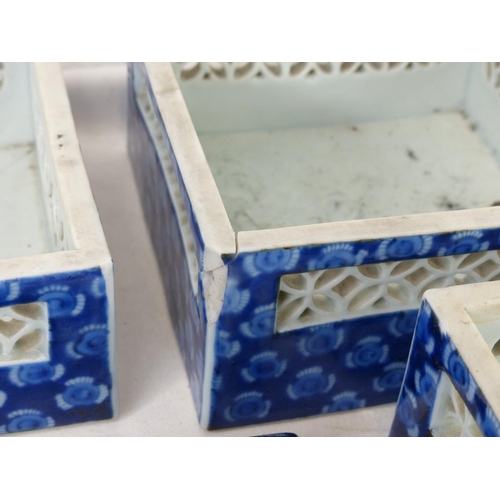 87 - A set of four Oriental style stacking boxes (a/f).
