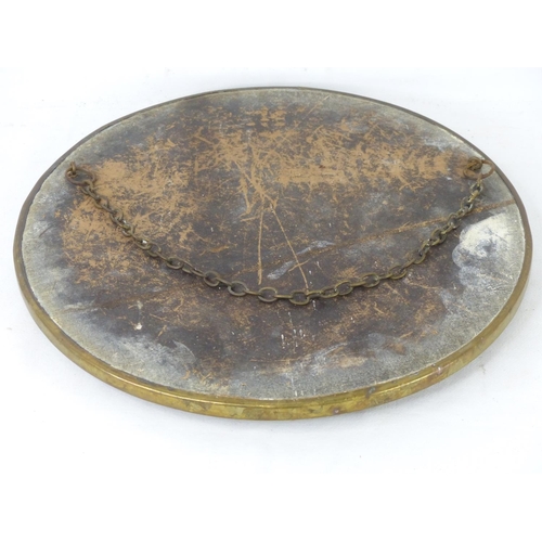 90 - A vintage nautical style wall mirror with brass frame.