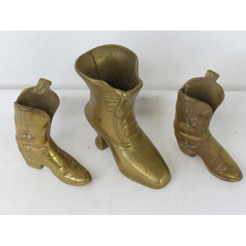 94 - Three ornamental brass boots.