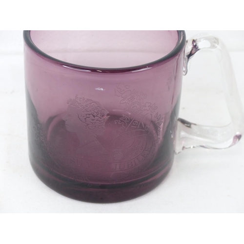 97 - A cranberry glass commemorative tankard celebrating 'The Silver Jubilee'.