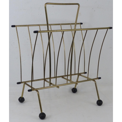 98 - A vintage metal 'Atomic' magazine rack.