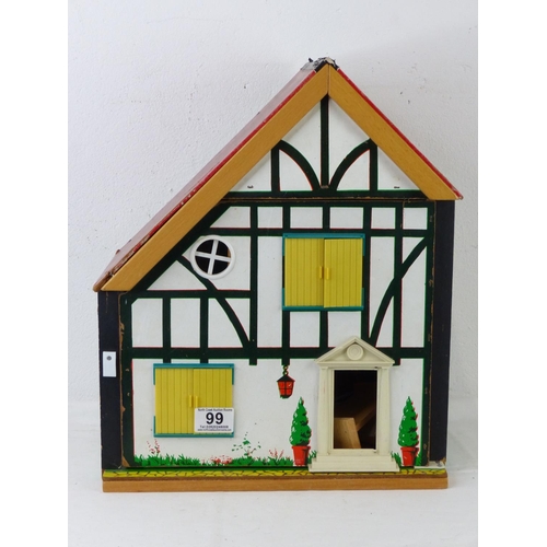 99 - A hand painted dolls house.