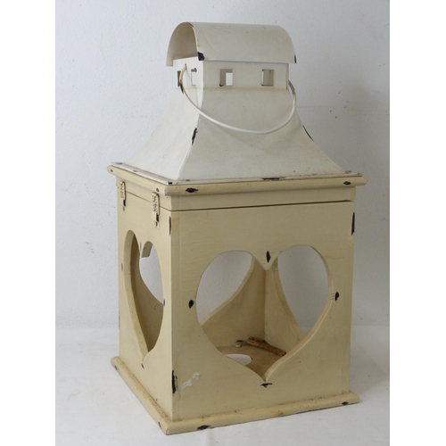 101 - A large wood and metal heart shaped lantern.